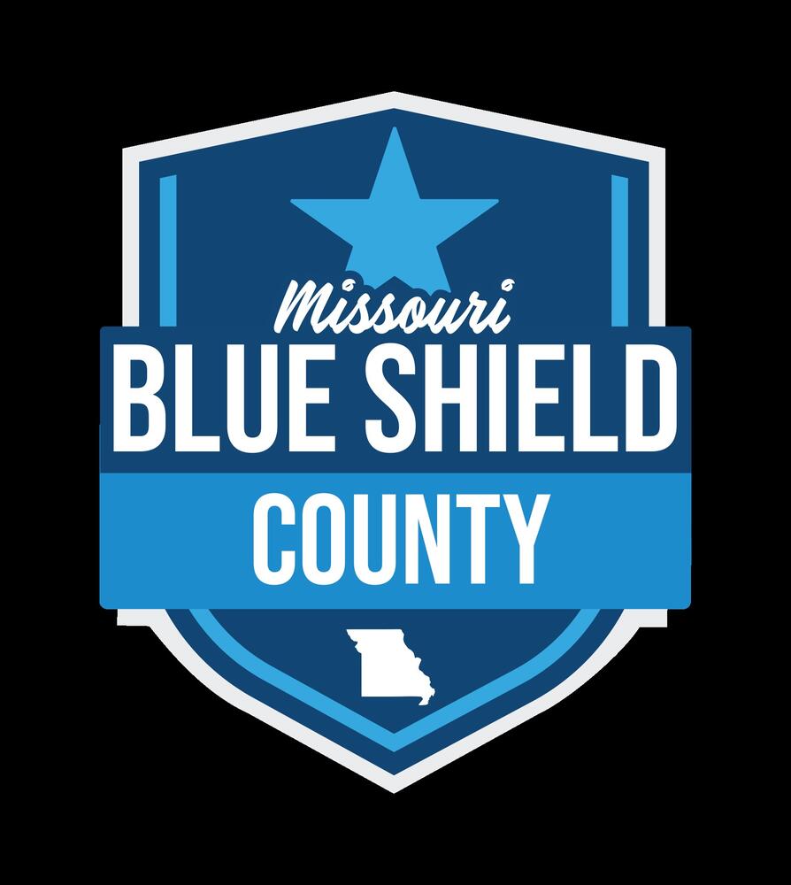 Missouri Blue Shield County blue and white logo on a black background