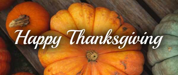 Happy Thanksgiving banner with pumpkins on wooden board.jpg