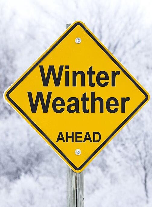 yellow caution sign winter warning